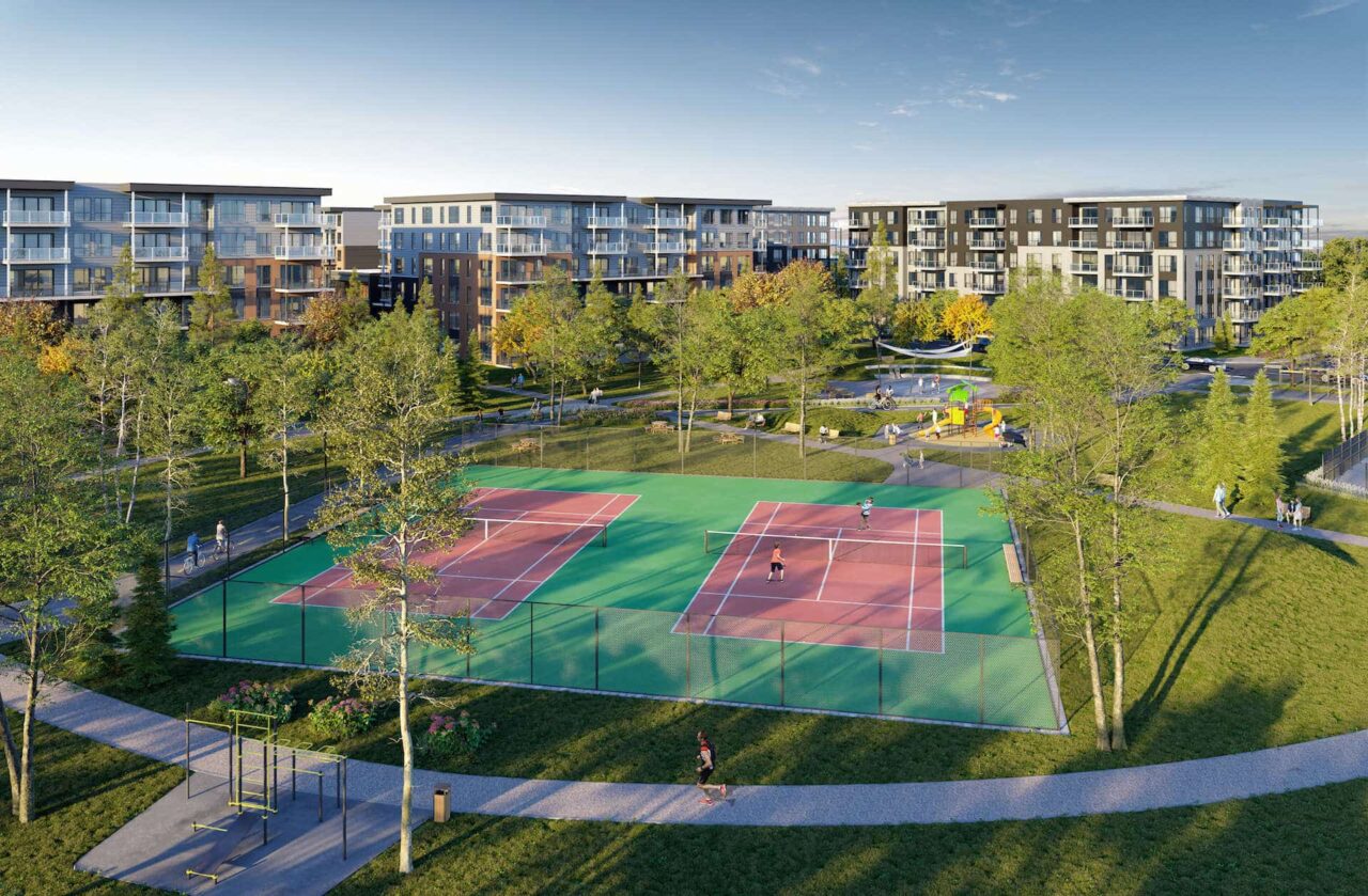 Vue d'ensemble du Faubourg Cousineau avec au centre le terrain de tennis